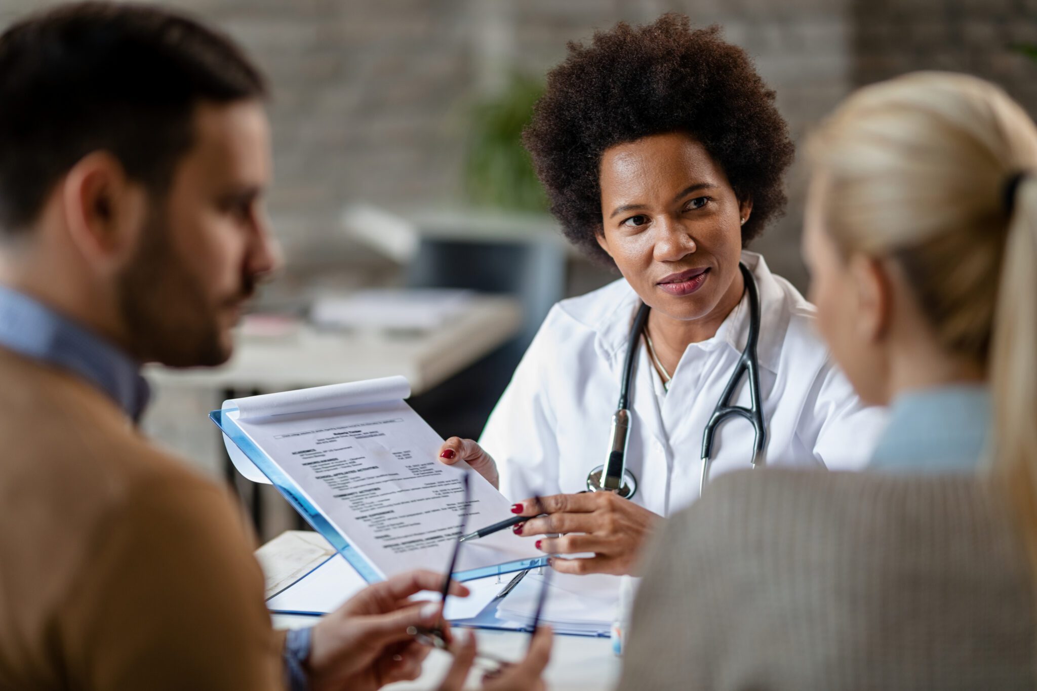 Doctor talking to patient